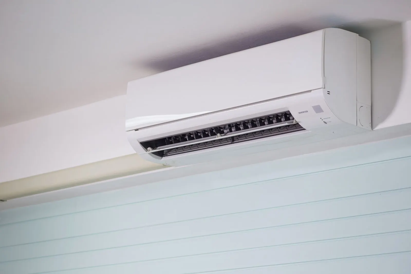 A wall-mounted split system air conditioner