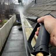 A gutter being cleared